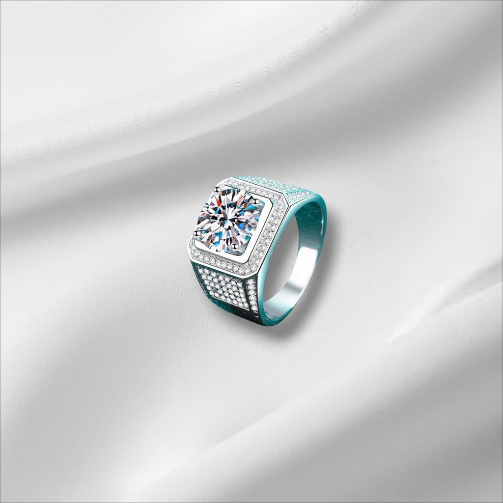 Bee-Bee's 5ct D Color Moissanite Hip Hop Ring in 925 Sterling Silver with 18k Gold plating. Features a large square-cut center stone surrounded by smaller stones.