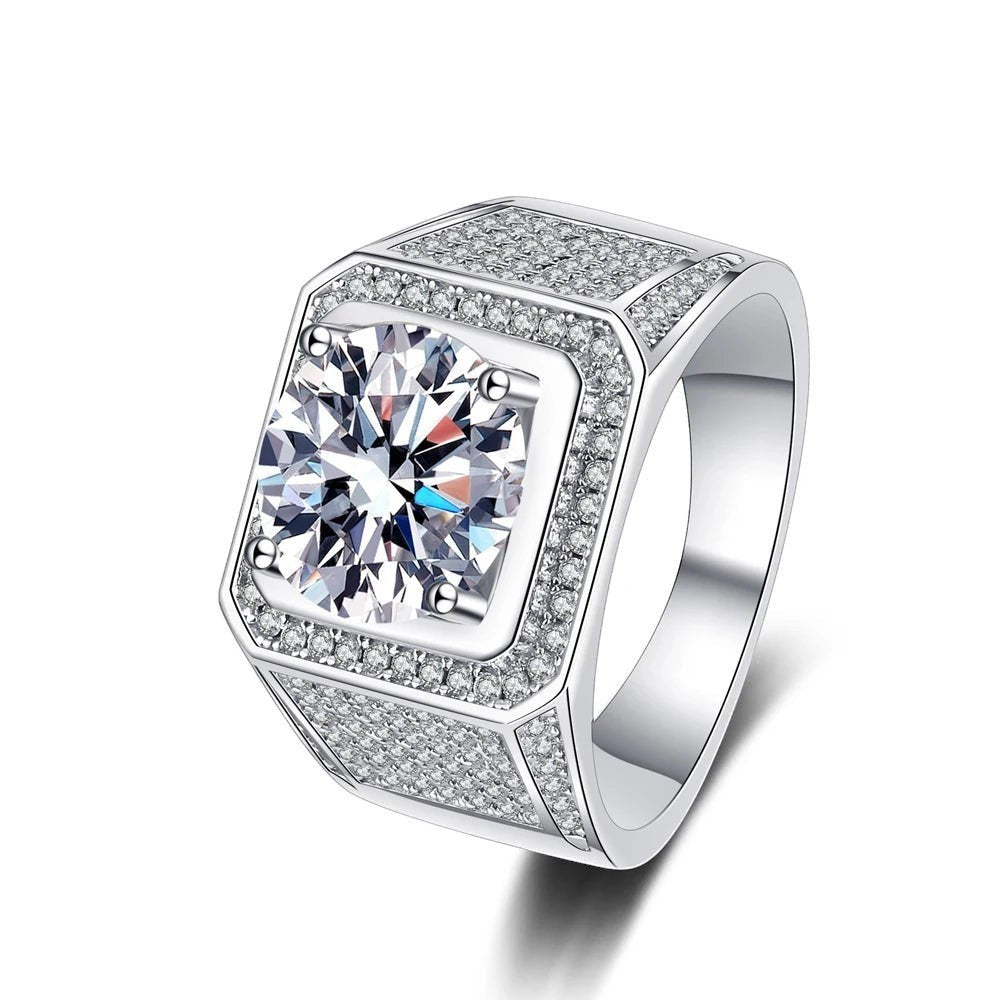 Bee-Bee's 5ct D Color Moissanite Hip Hop Ring in 925 Sterling Silver with 18k Gold Plating. Features a large center stone surrounded by smaller stones.
