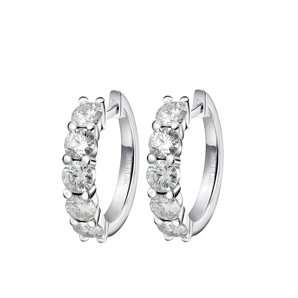 Bee-Bees white gold plated sterling silver hoop earrings with 3mm & 4mm D color moissanite stones.