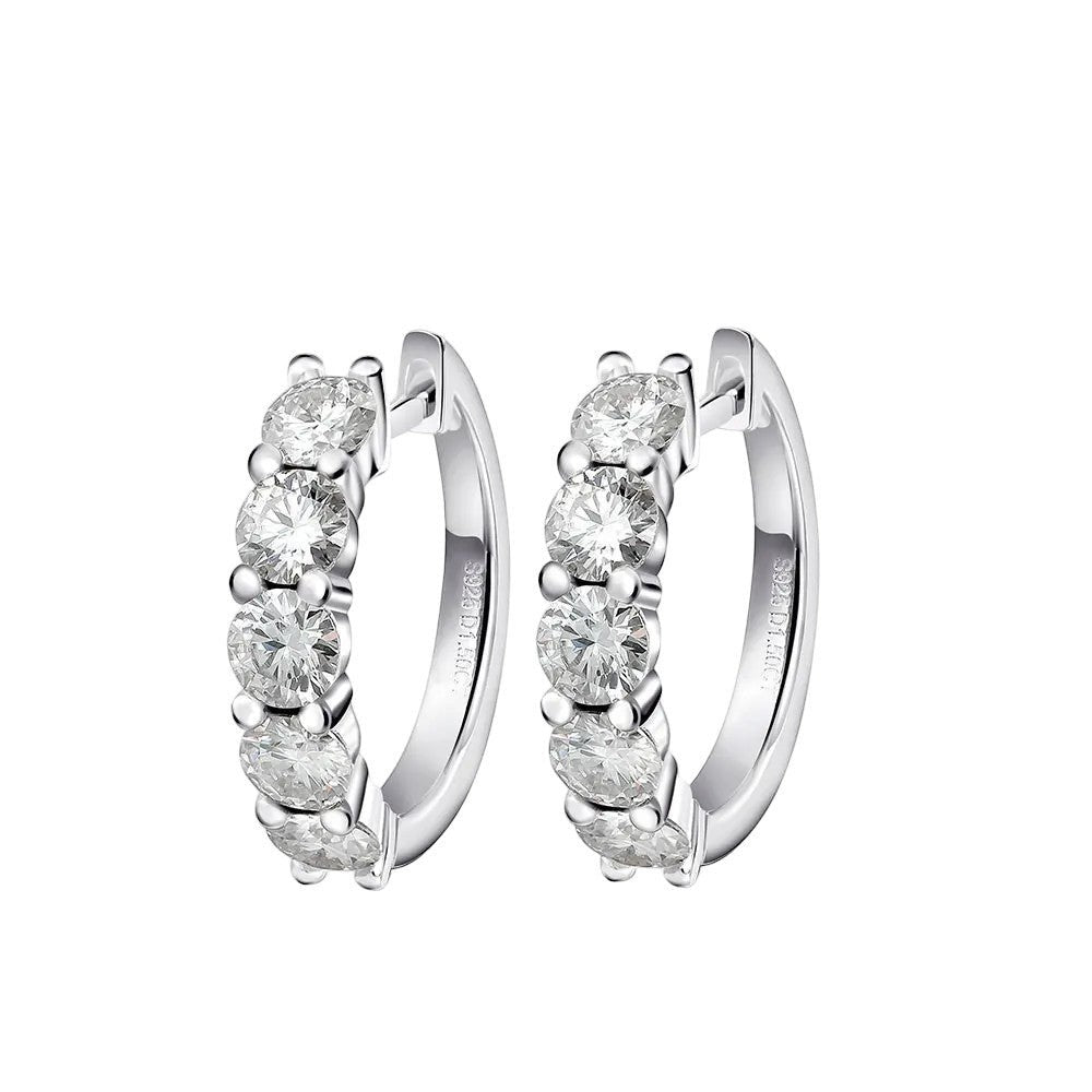 Bee-Bees white gold plated sterling silver hoop earrings with 3mm & 4mm D color moissanite stones.