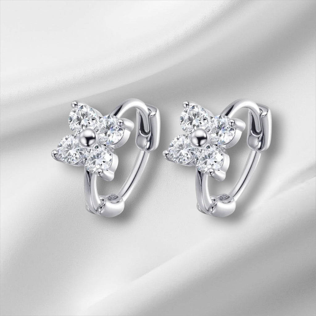 Bee-Bee's 3mm moissanite hoop earrings in sterling silver with a flower design, D color, VVS1 clarity.