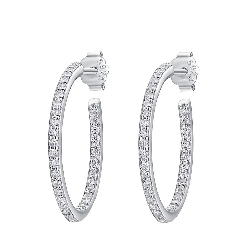 Bee-Bees dainty 1.5mm D color moissanite hoop earrings in sterling silver with white gold plating.