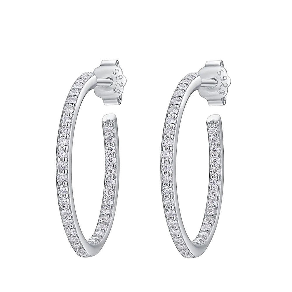 Bee-Bees dainty 1.5mm D color moissanite hoop earrings in sterling silver with white gold plating.