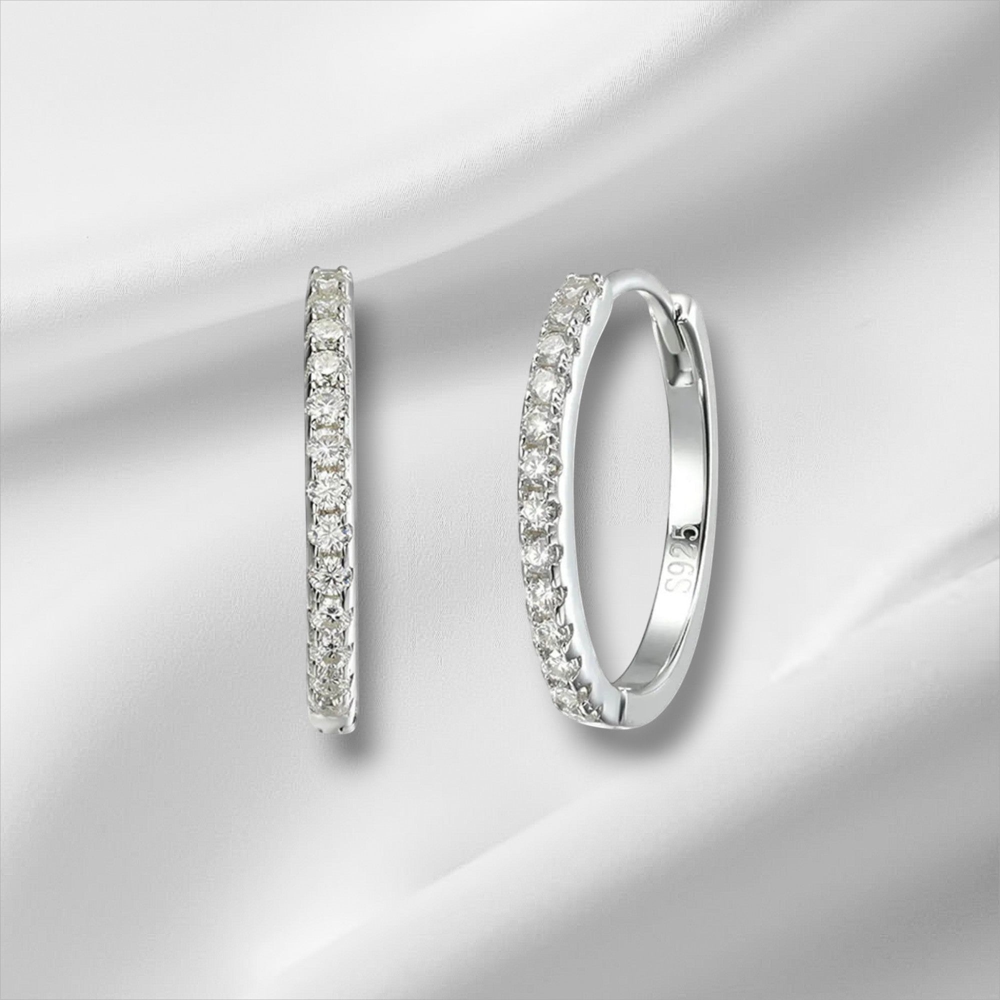 Bee-Bee's sterling silver hoop earrings with D Color VVS1 moissanite stones, 18K white gold plated.