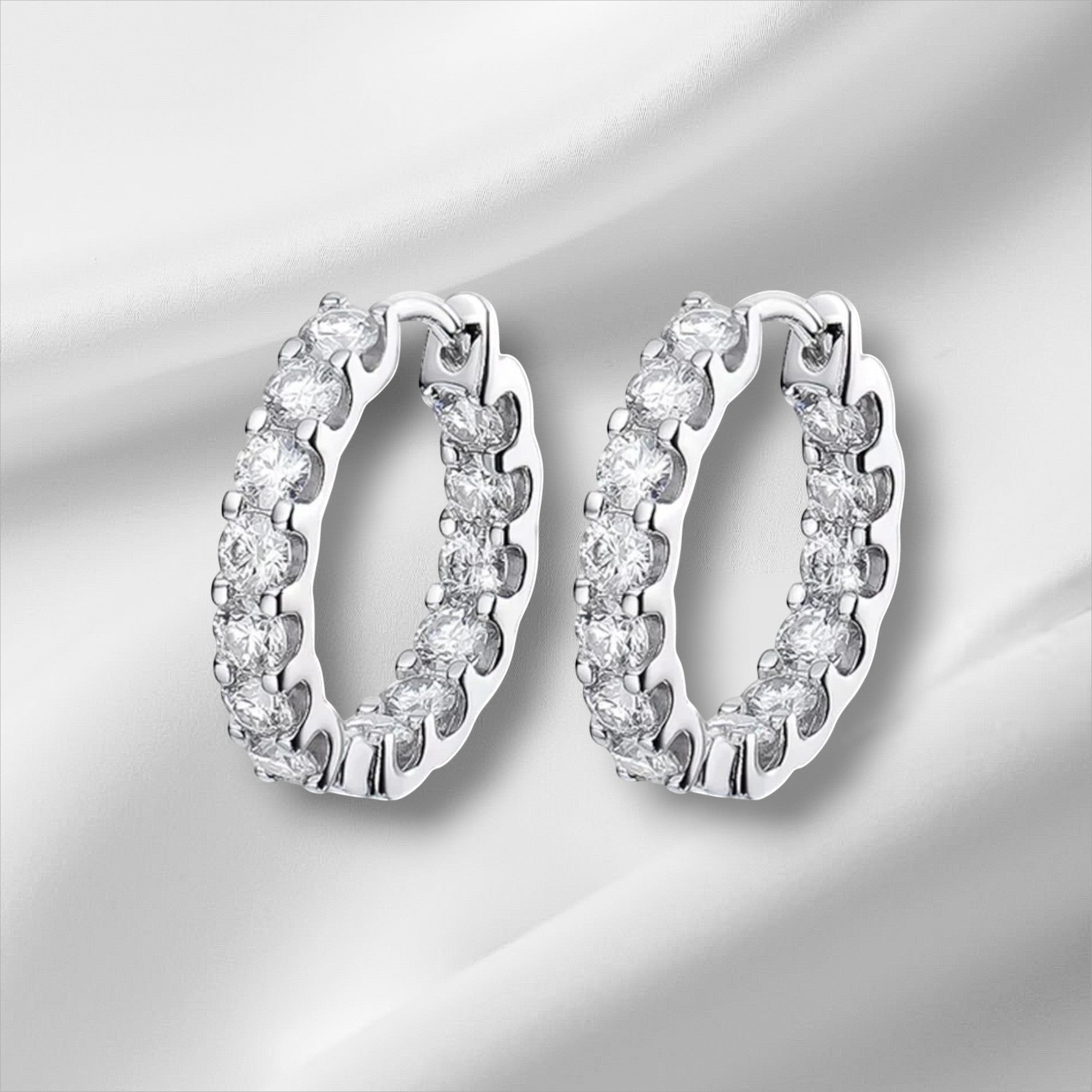 Bee-Bees 2.6ctw D Color Moissanite Eternity Hoop Earrings in 18k White Gold Plated Silver with secure latch backing.