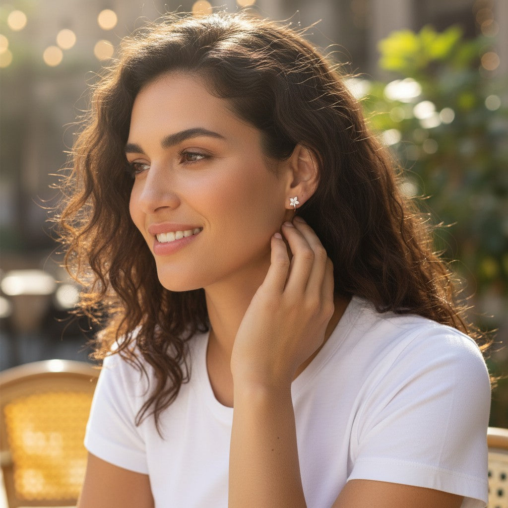 Bee-Bees 3mm D color VVS1 moissanite hoop earrings in 18K gold plated sterling silver worn by a smiling woman.