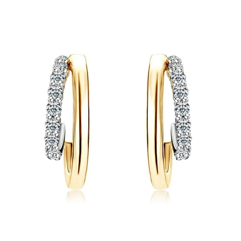 Bee-Bees yellow gold plated sterling silver huggie hoop earrings with pave-set D Color VVS1 moissanite stones.