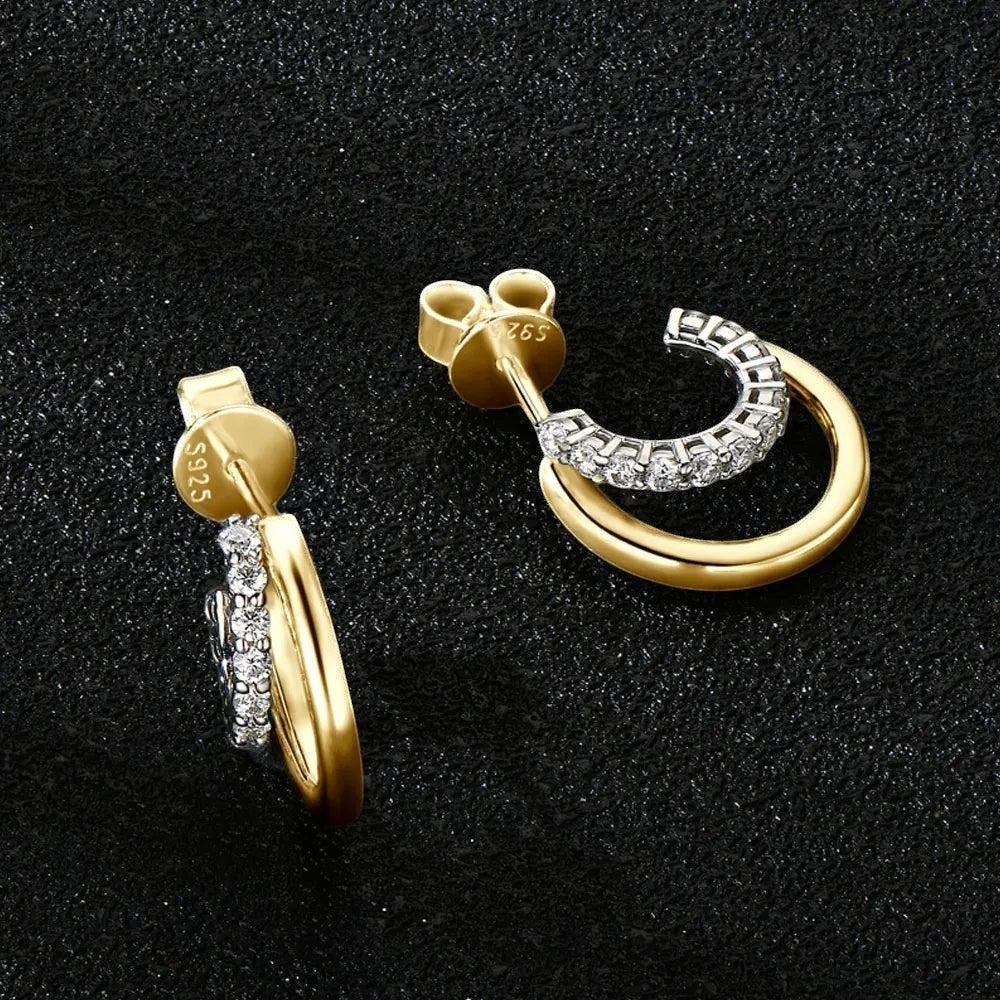 Bee-Bee's gold plated sterling silver huggie hoop earrings with pave set D Color VVS1 moissanite stones.
