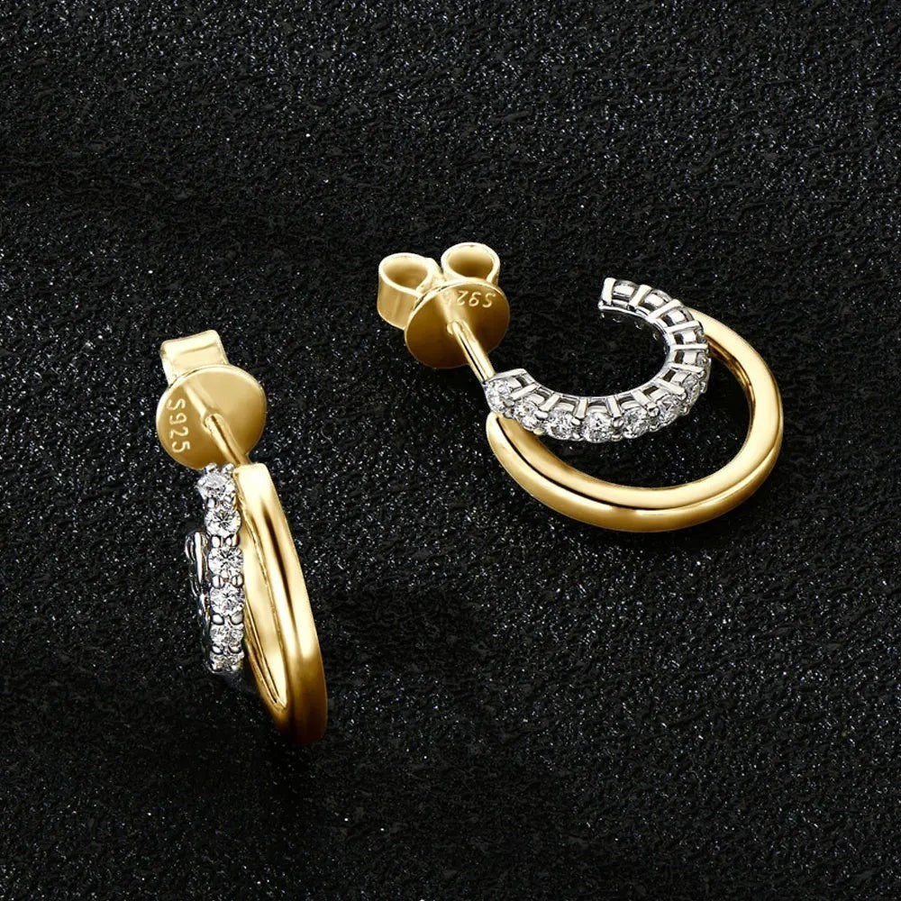 Bee-Bee's gold plated sterling silver huggie hoop earrings with pave set D Color VVS1 moissanite stones.