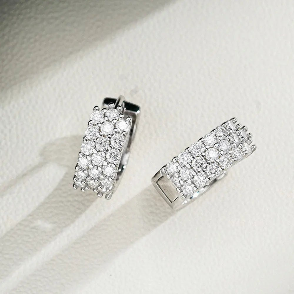 Bee-Bees sterling silver huggie hoop earrings with D Color VVS1 Moissanite stones, 18K white gold plated.