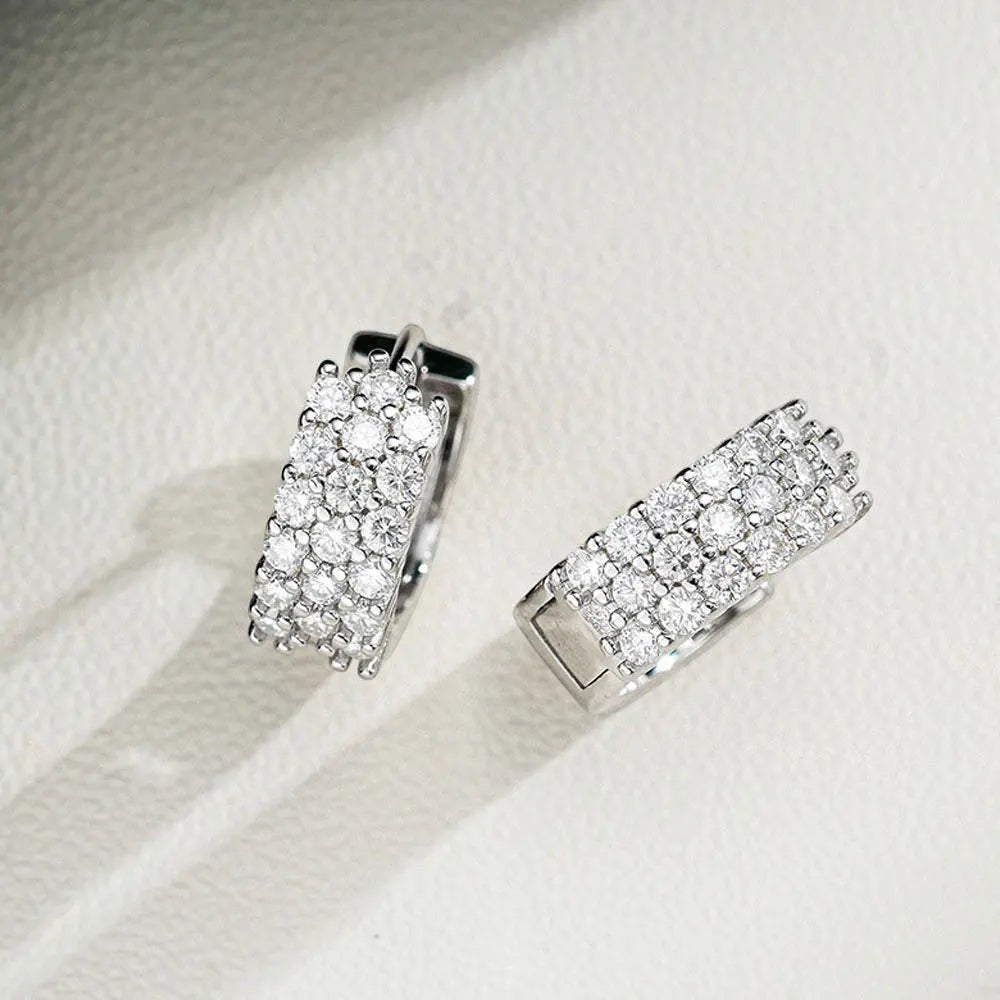 Bee-Bees sterling silver huggie hoop earrings with D Color VVS1 Moissanite stones, 18K white gold plated.