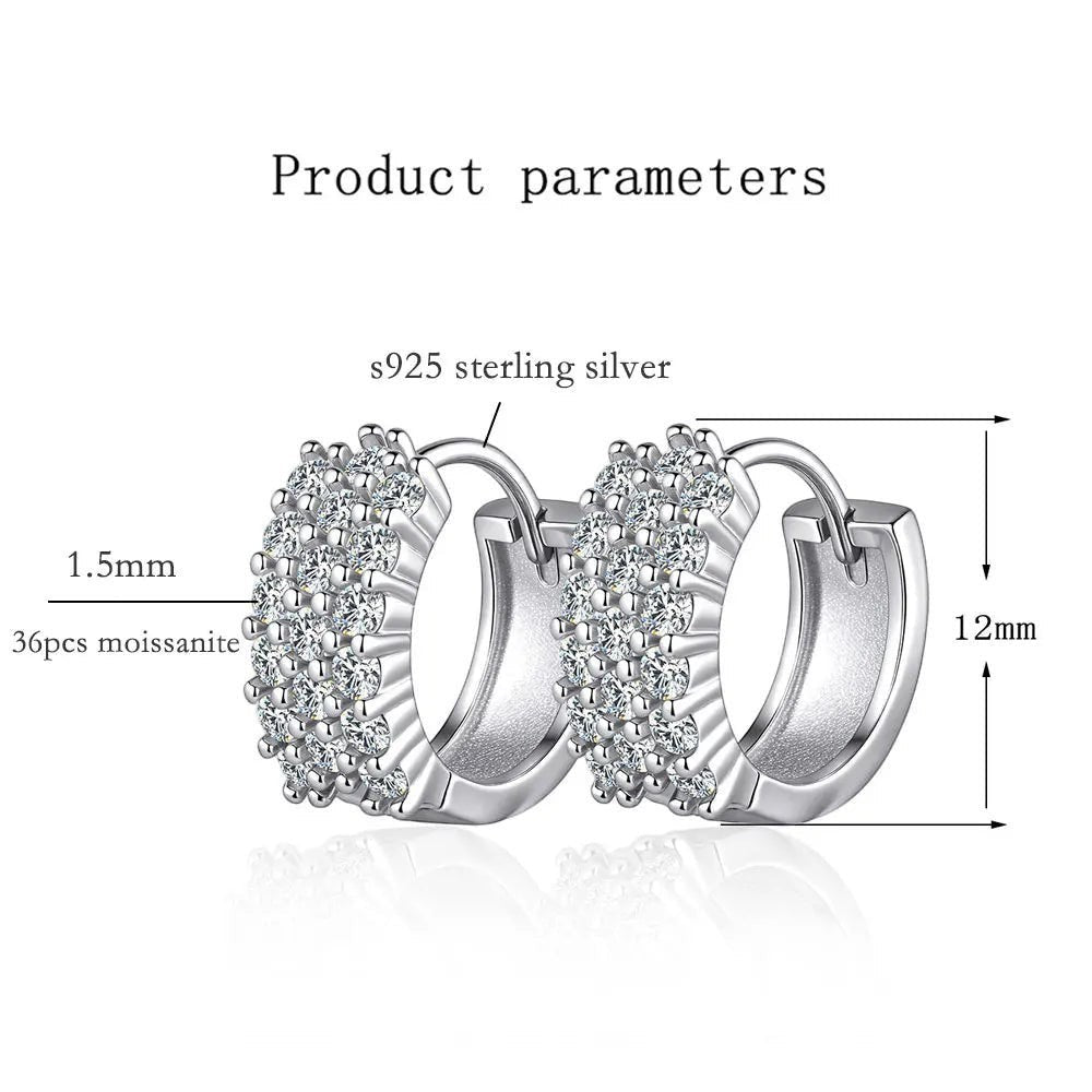 Bee-Bees D Color VVS1 Moissanite Huggie Hoop Earrings in 925 Sterling Silver, 12mm diameter, 1.5mm stone width, 36 stones per earring.