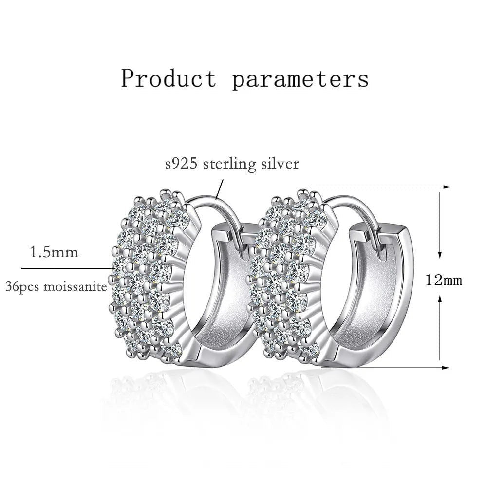 Bee-Bees D Color VVS1 Moissanite Huggie Hoop Earrings in 925 Sterling Silver, 12mm diameter, 1.5mm stone width, 36 stones per earring.