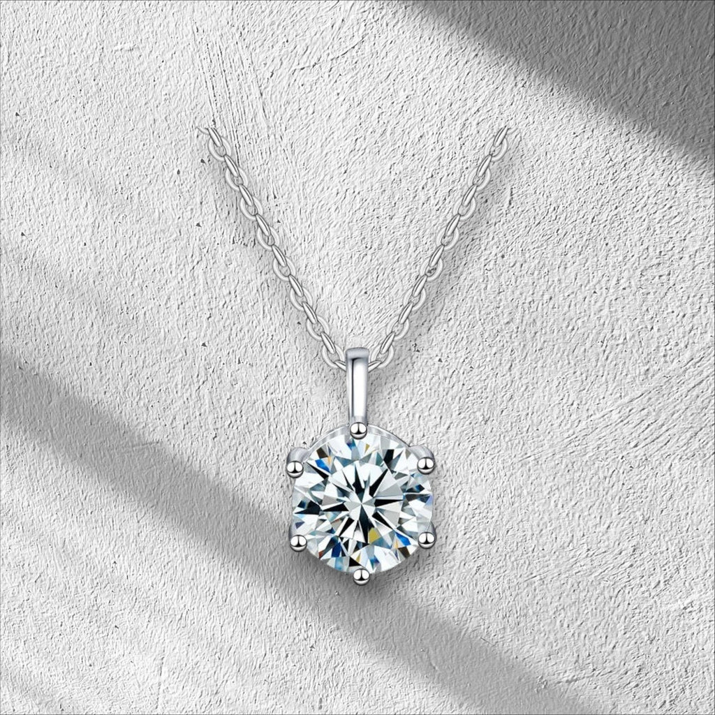 Bee-Bee's 2ct D Color Moissanite pendant necklace in 925 Sterling Silver with GRA certificate. Round brilliant cut.