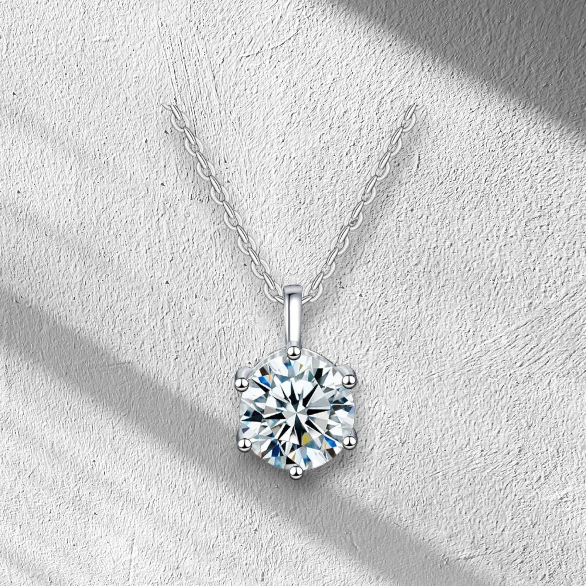 Bee-Bee's 2ct D Color Moissanite pendant necklace in 925 Sterling Silver with GRA certificate. Round brilliant cut.