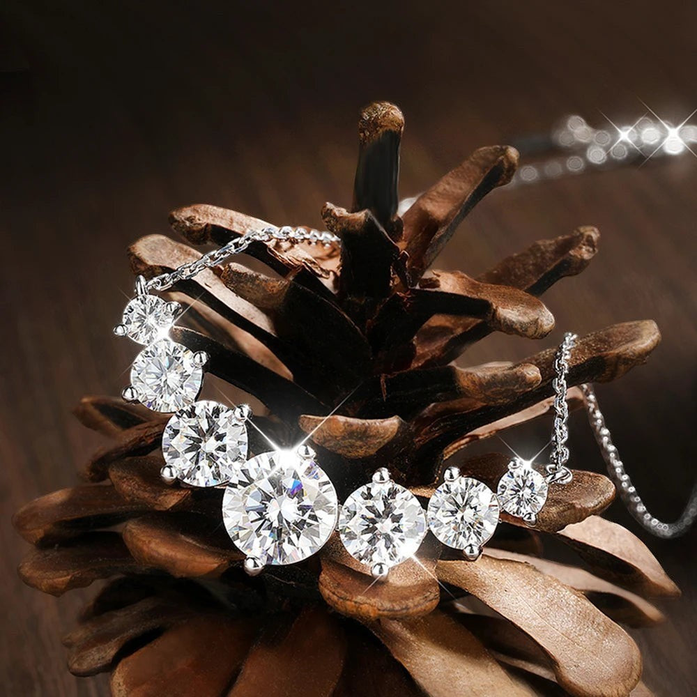 Bee-Bee's sterling silver necklace with multiple round-cut moissanite stones, 18K white gold plated.