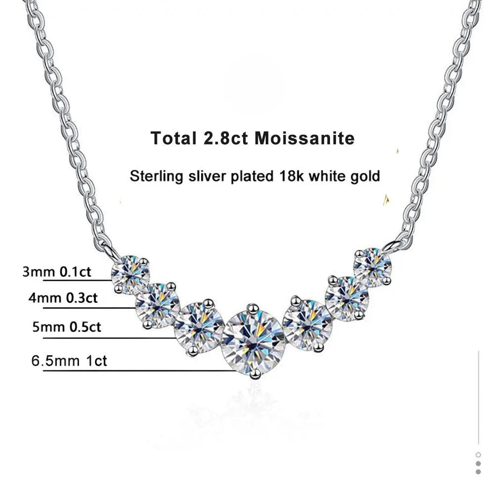 Bee-Bee's sterling silver necklace with 2.8ct total moissanite stones, plated in 18K white gold. Features graduated oval-cut stones.