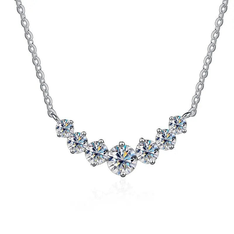 Bee-Bee's 925 Sterling Silver necklace with 7 round-cut D Color VVS1 Moissanite stones in a graduated curve design, 18K white gold plated.