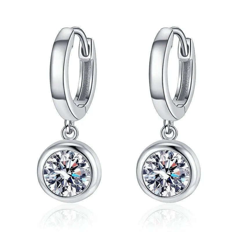 Bee-Bee's sterling silver hoop earrings with a dangling round moissanite pendant, D color VVS1 clarity.