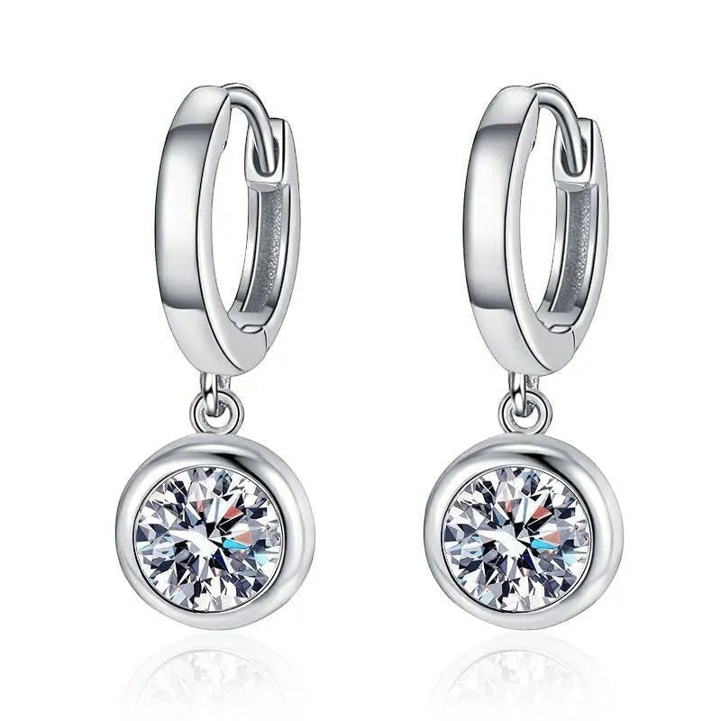 Bee-Bee's sterling silver hoop earrings with a dangling round moissanite pendant, D color VVS1 clarity.