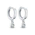 Bee-Bee's sterling silver hoop earrings with dangling moissanite pendants. D color VVS1 stones.