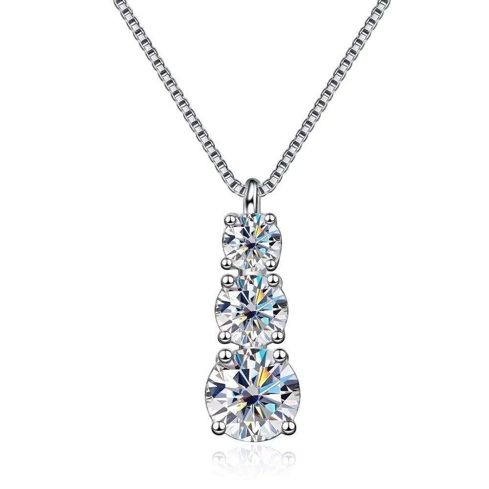 Bee-Bees sterling silver necklace with three round brilliant cut moissanite stones in a vertical drop design, D color, VVS1 clarity.