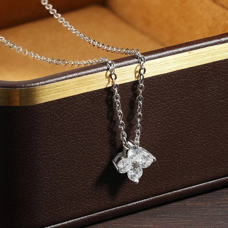 Bee-Bee's 0.4ct Moissanite pendant necklace with four round-cut stones in a clover design, crafted from S925 silver with 18k gold plating.