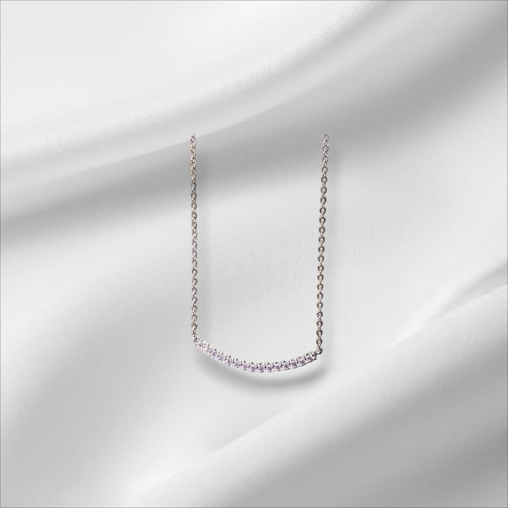 Bee-Bees D VVS1 Moissanite smile pendant necklace in 18k gold plated sterling silver with a curved row of sparkling stones.