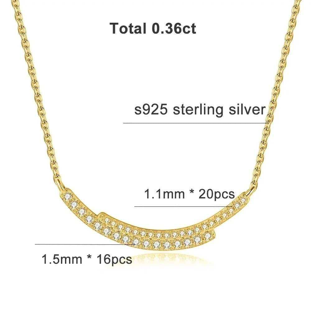 Bee-Bees yellow gold plated s925 sterling silver necklace with a curved smile pendant set with D VVS1 Moissanite stones.