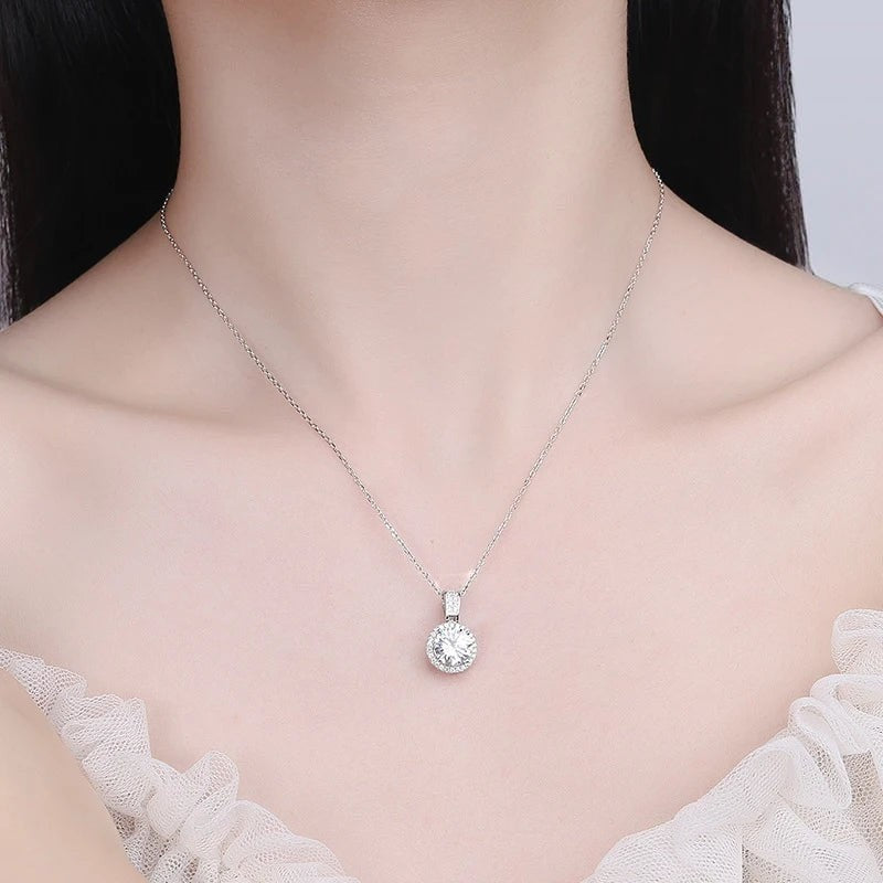 Bee-Bees sterling silver solitaire necklace with round-cut Moissanite pendant, 18k gold plating, and anti-tarnish finish.