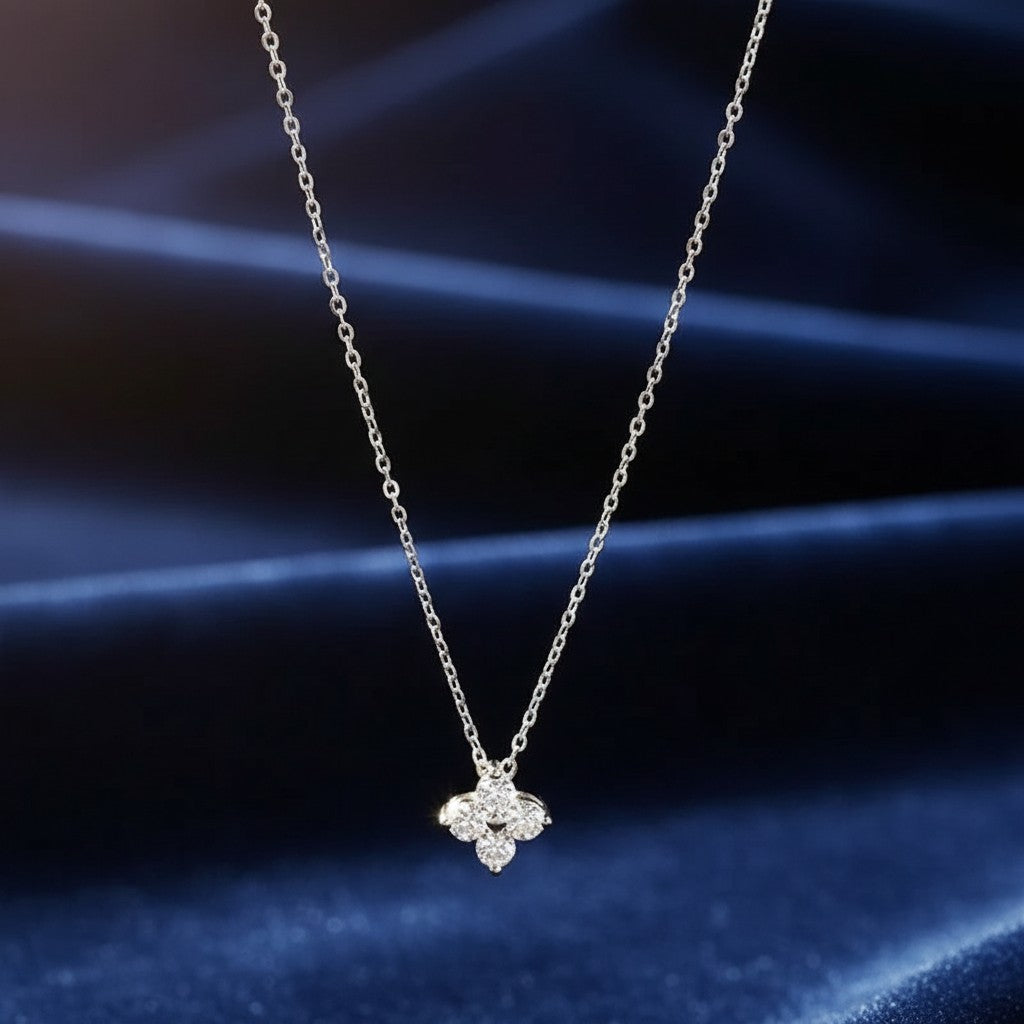 Bee-Bee's 0.4ct Moissanite solitaire pendant necklace in S925 silver with gold plating, featuring a four-petal flower design.