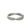 Bee-Bees sterling silver eternity band with round moissanite stones in a curved stacking ring design