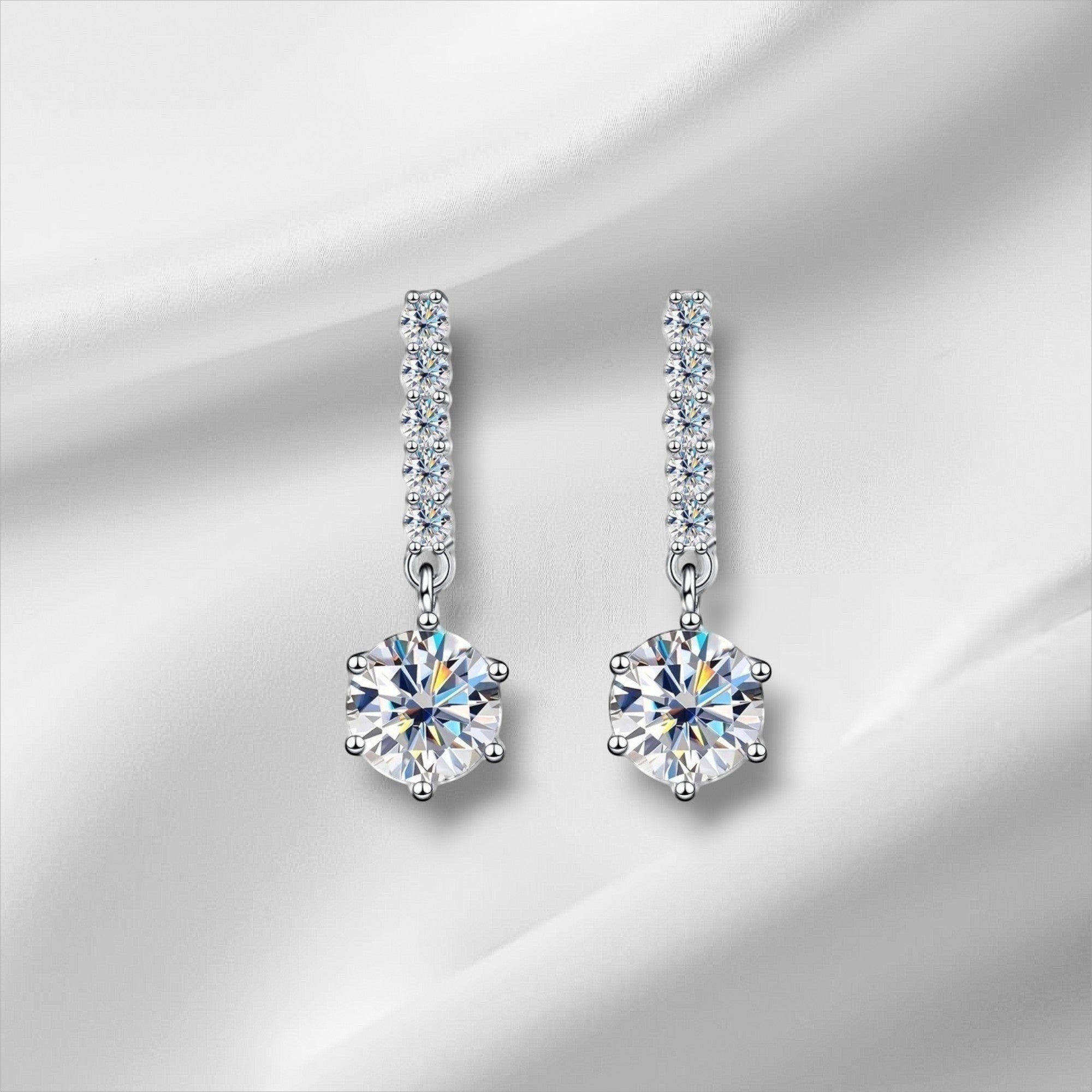 Bee-Bees 1ct D Color Moissanite Stud Earrings in 18k white gold plated sterling silver with GRA certificate.