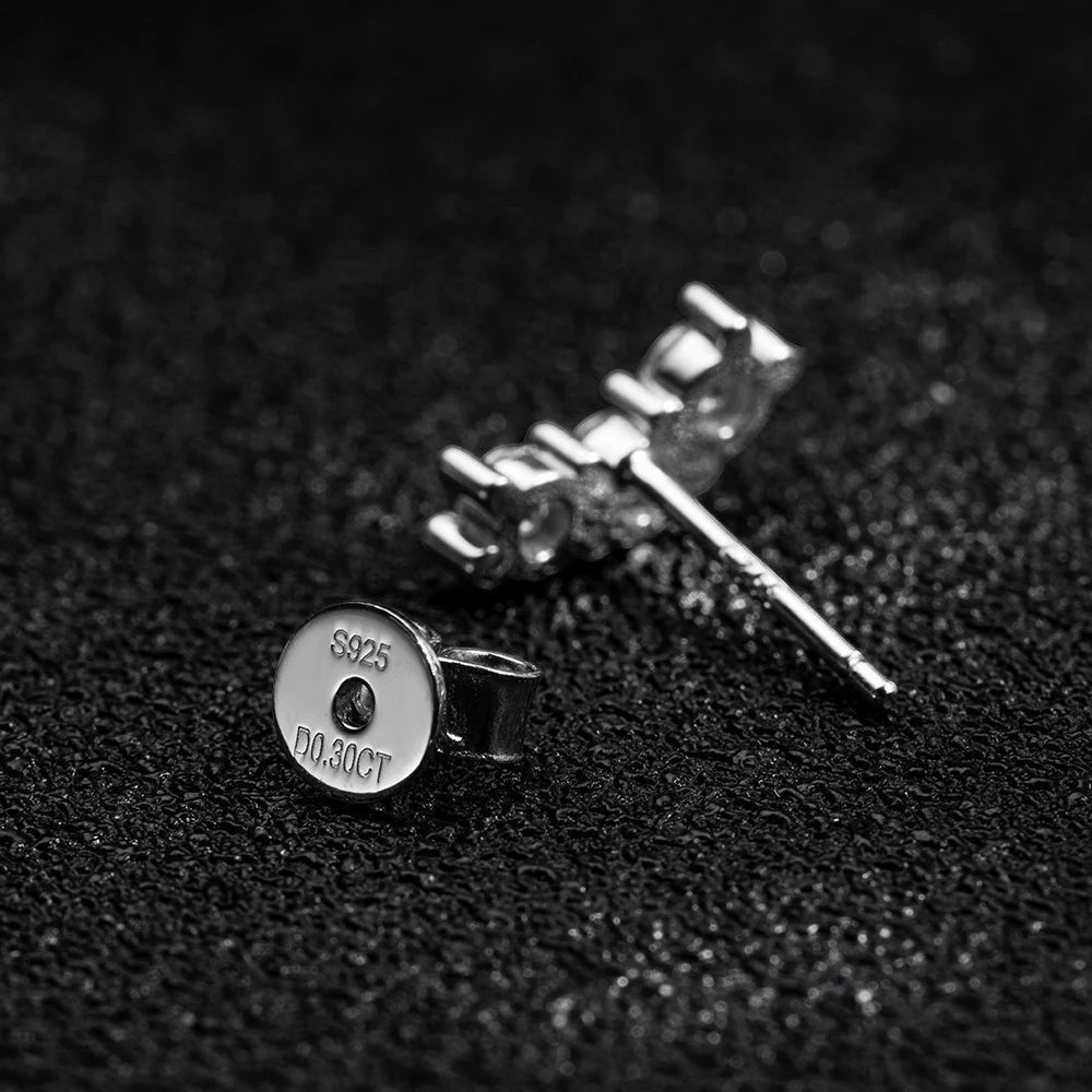 Bee-Bees D Color VVS1 Moissanite Stud Earrings in 925 Sterling Silver with 18K White Gold plating. Round brilliant cut.