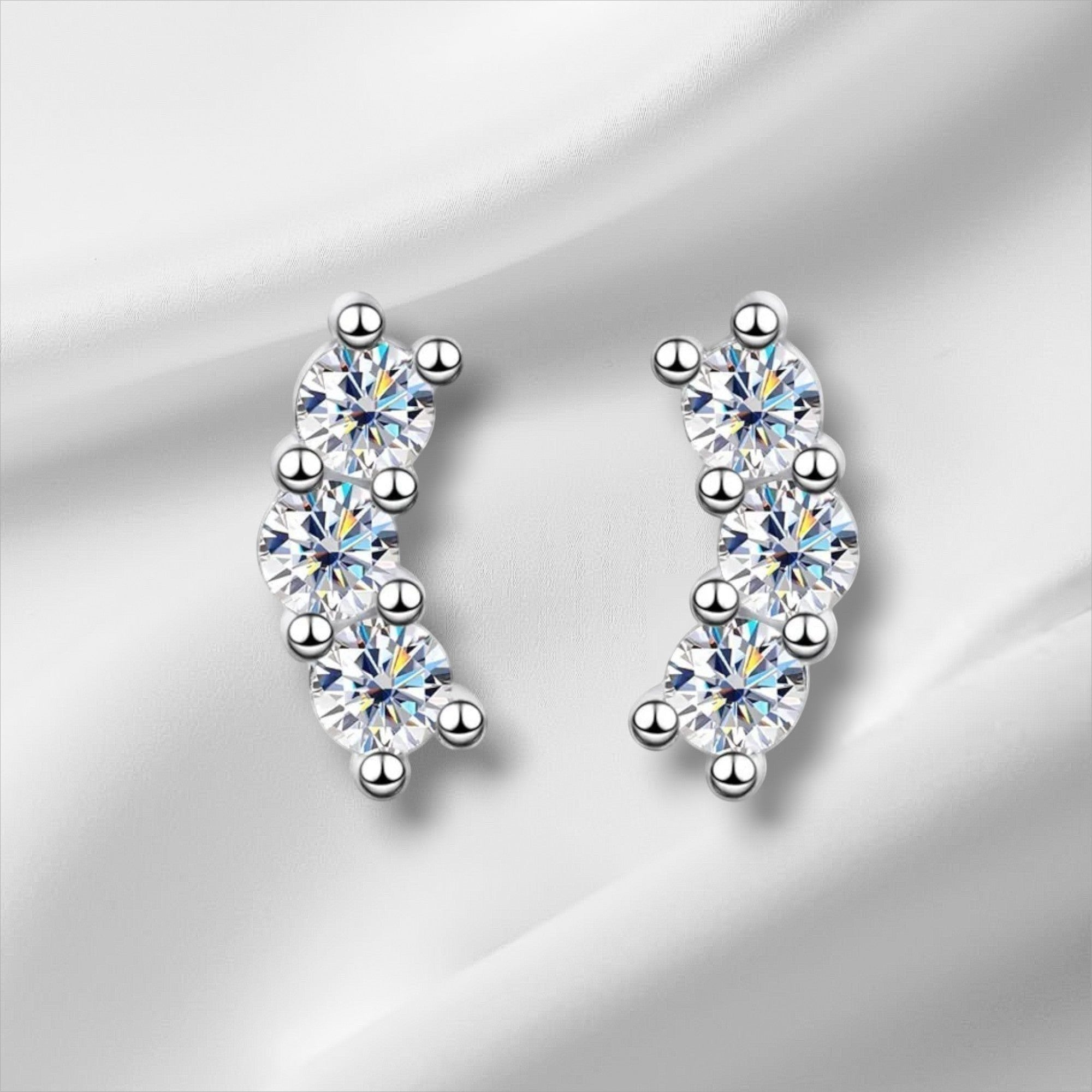 Bee-Bees D Color VVS1 Full Moissanite Studs in 925 Sterling Silver, 4-prong setting, round brilliant cut, white gold plated.