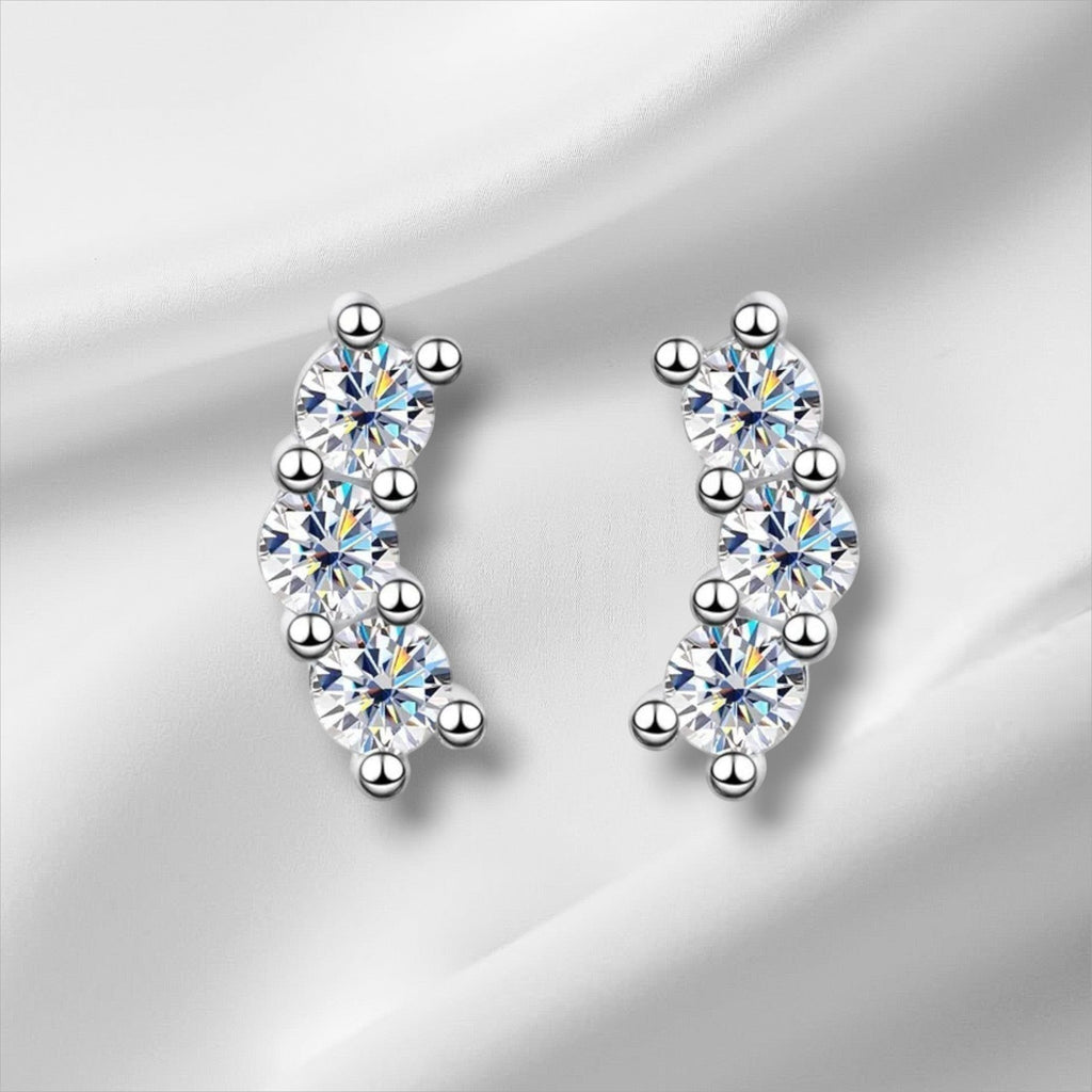 Bee-Bees D Color VVS1 Full Moissanite Studs in 925 Sterling Silver, 4-prong setting, round brilliant cut, white gold plated.