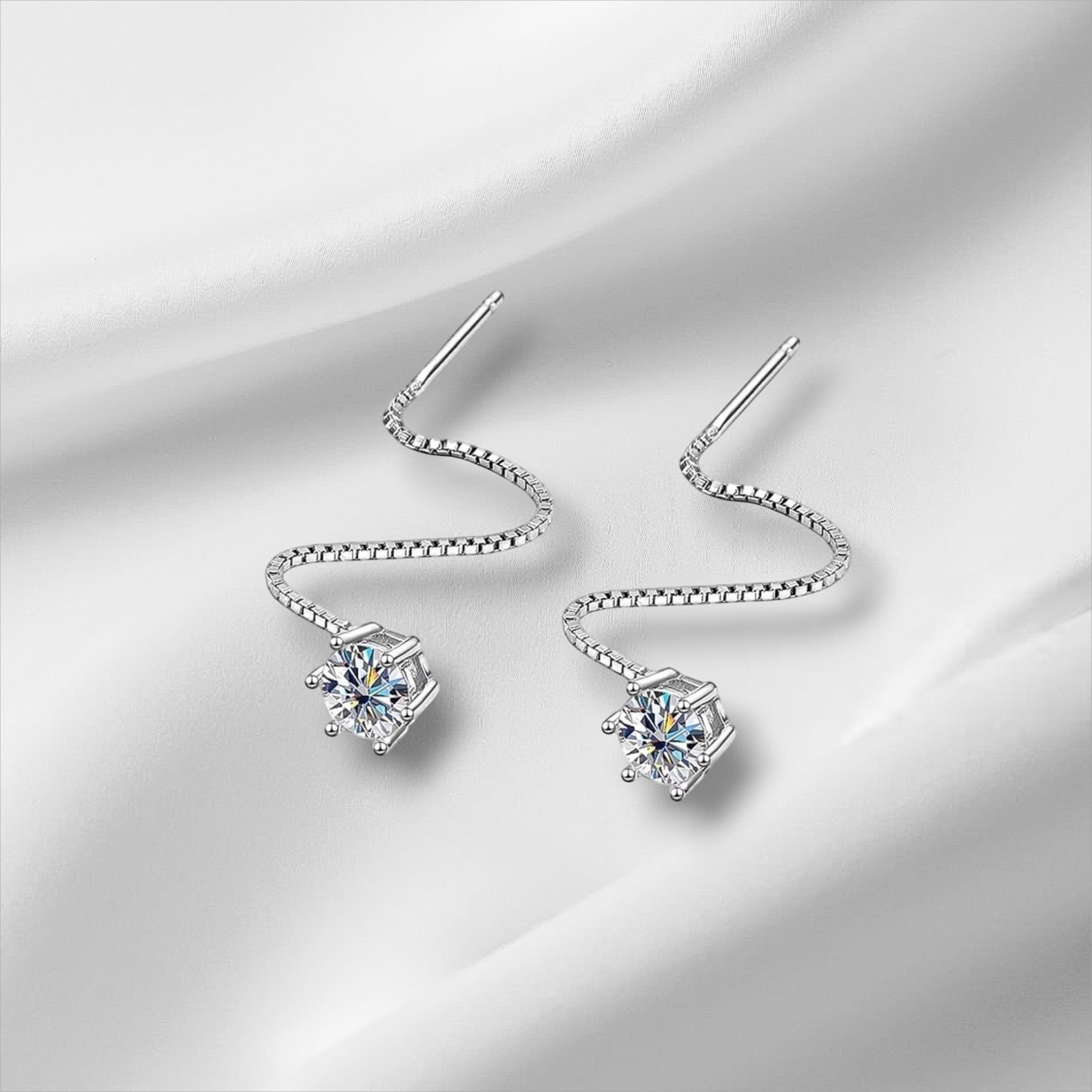Bee-Bee's S925 Sterling Silver D VVS Moissanite stud earrings with a unique wavy chain design and secure ear stud backings.