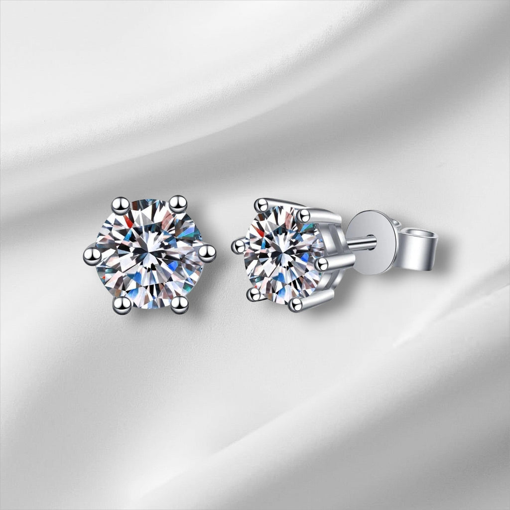 Bee-Bees 6-prong moissanite stud earrings in sterling silver with screw backs, D color, VVS1 clarity.