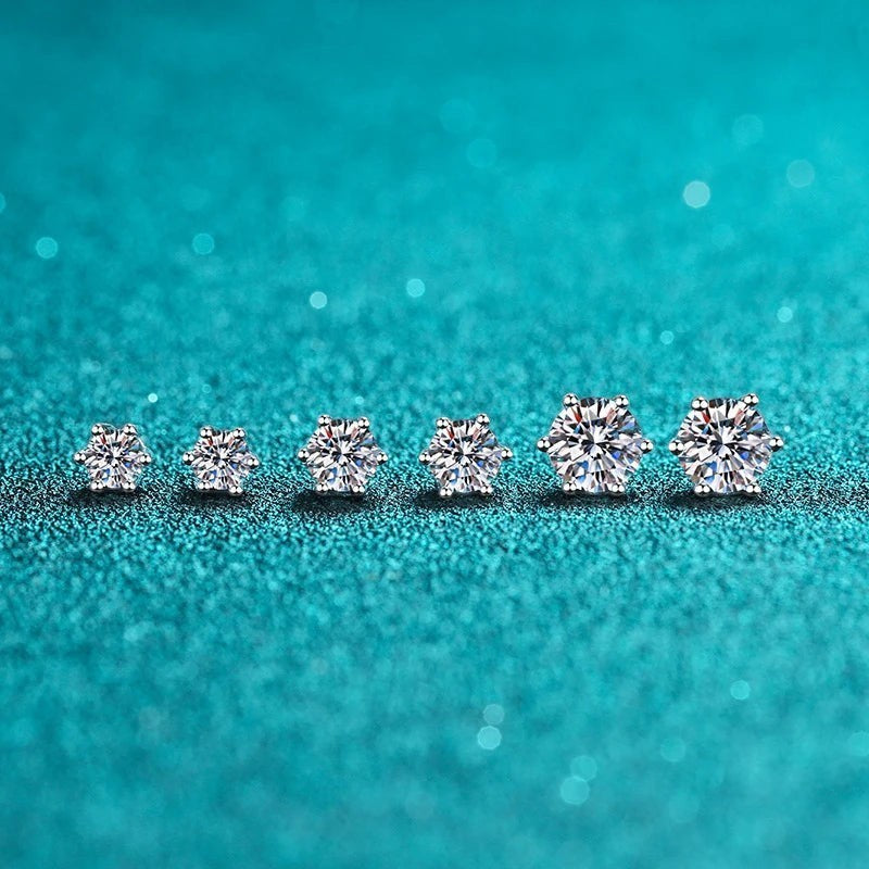 Bee-Bees 6-claw moissanite stud earrings in sterling silver with screw backs, available in various sizes.