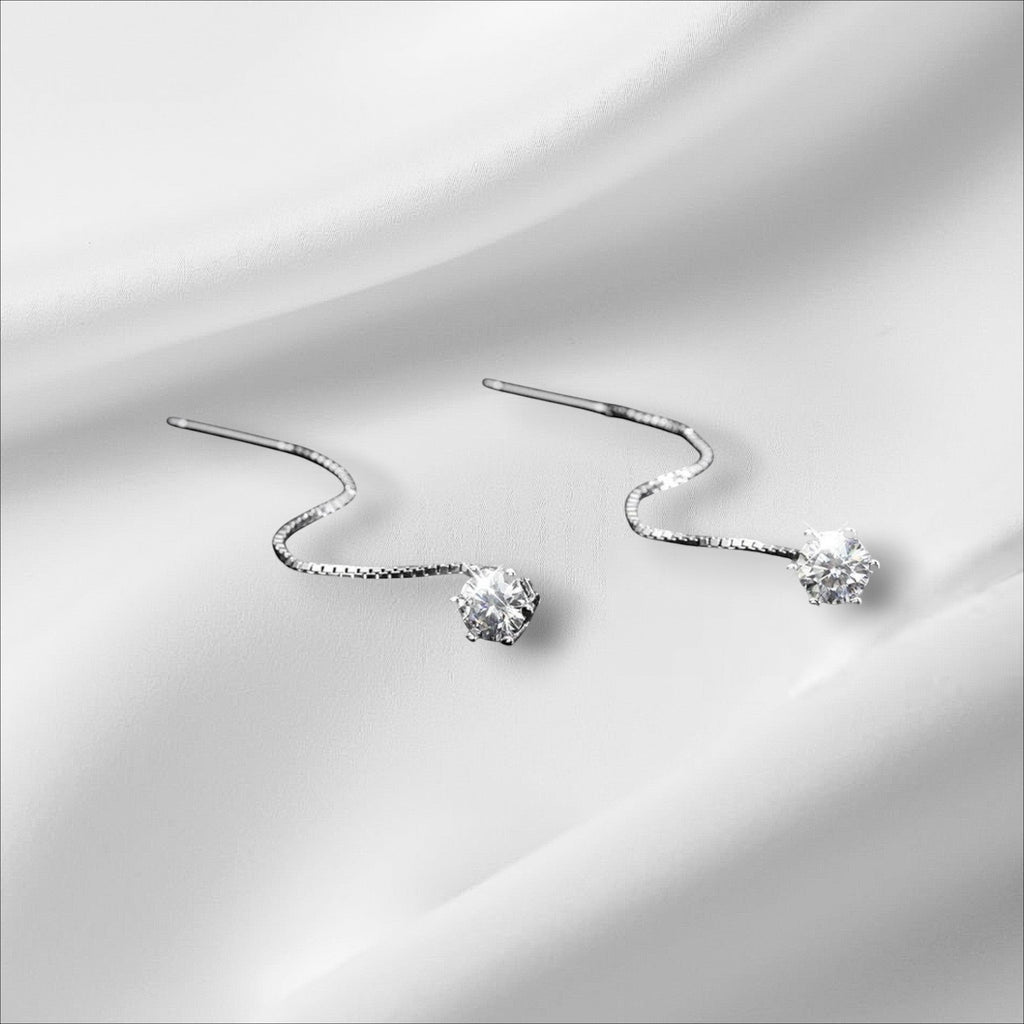 Bee-Bee's D VVS Moissanite stud earrings in S925 sterling silver with 18k white gold plating. Round cut, colorless, VVS clarity.