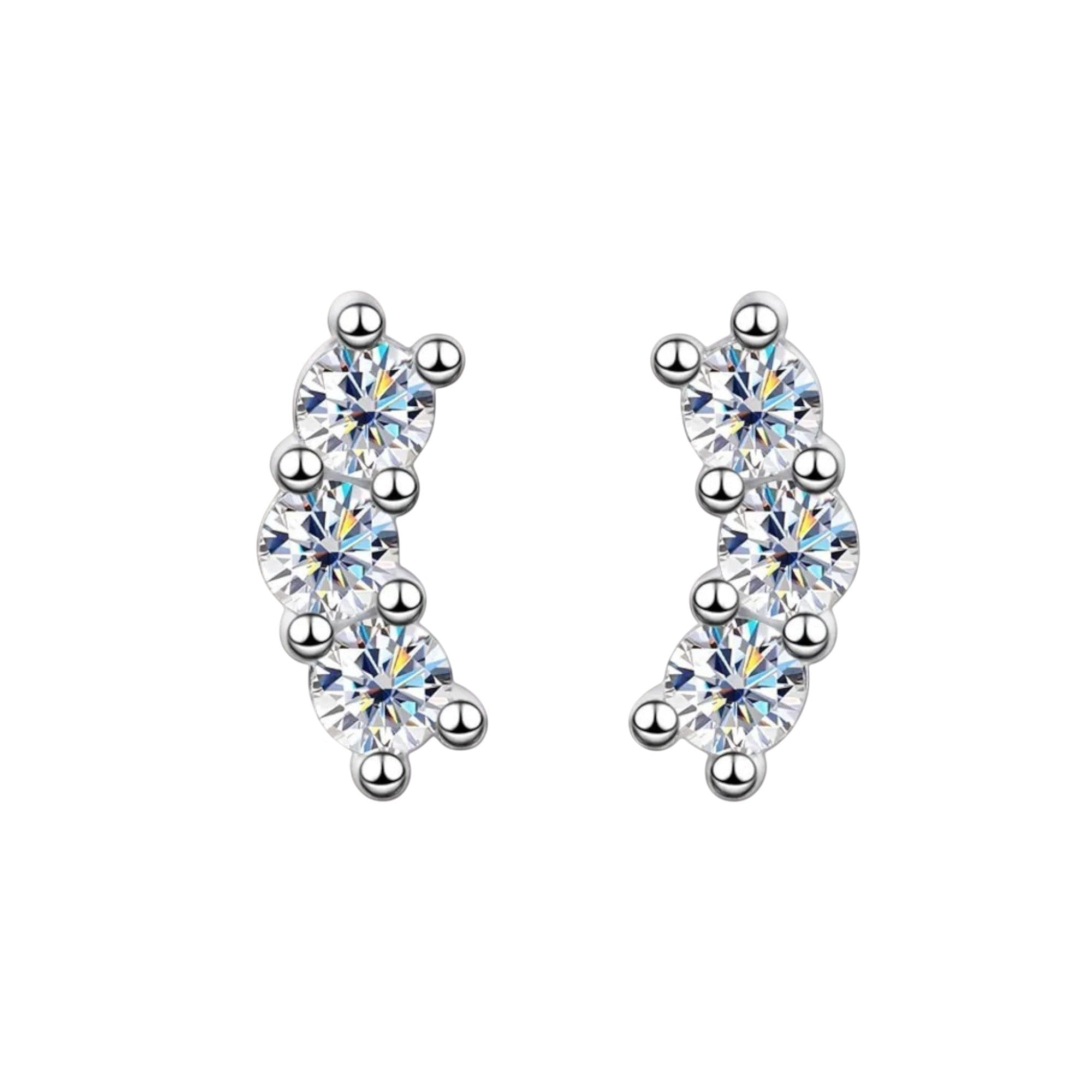 Bee-Bees D Color VVS1 Full Moissanite Studs in 925 Sterling Silver with 18K White Gold plating. Round brilliant cut stones set in a curved design with small silver beads.