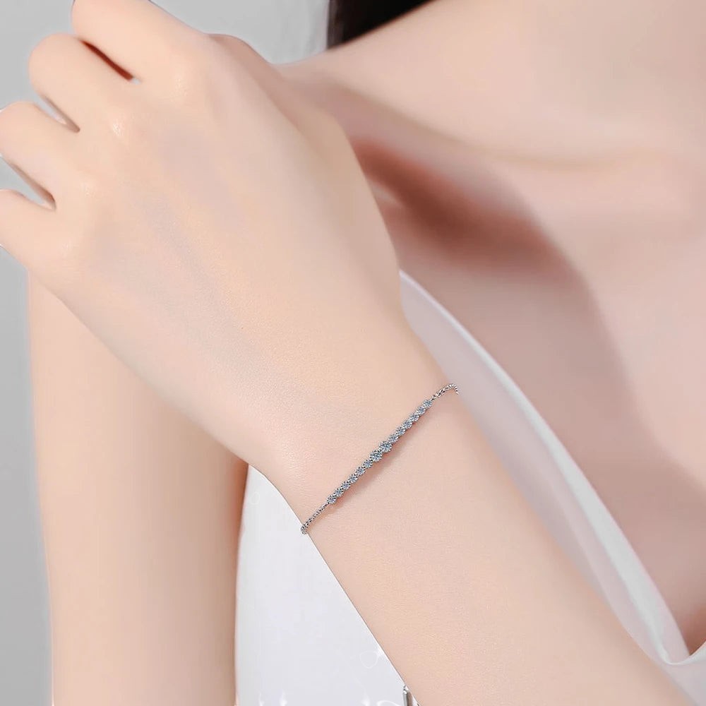 Bee-Bee's D VVS1 Moissanite Tennis Bracelet in S925 Sterling Silver with 18k white gold plating.