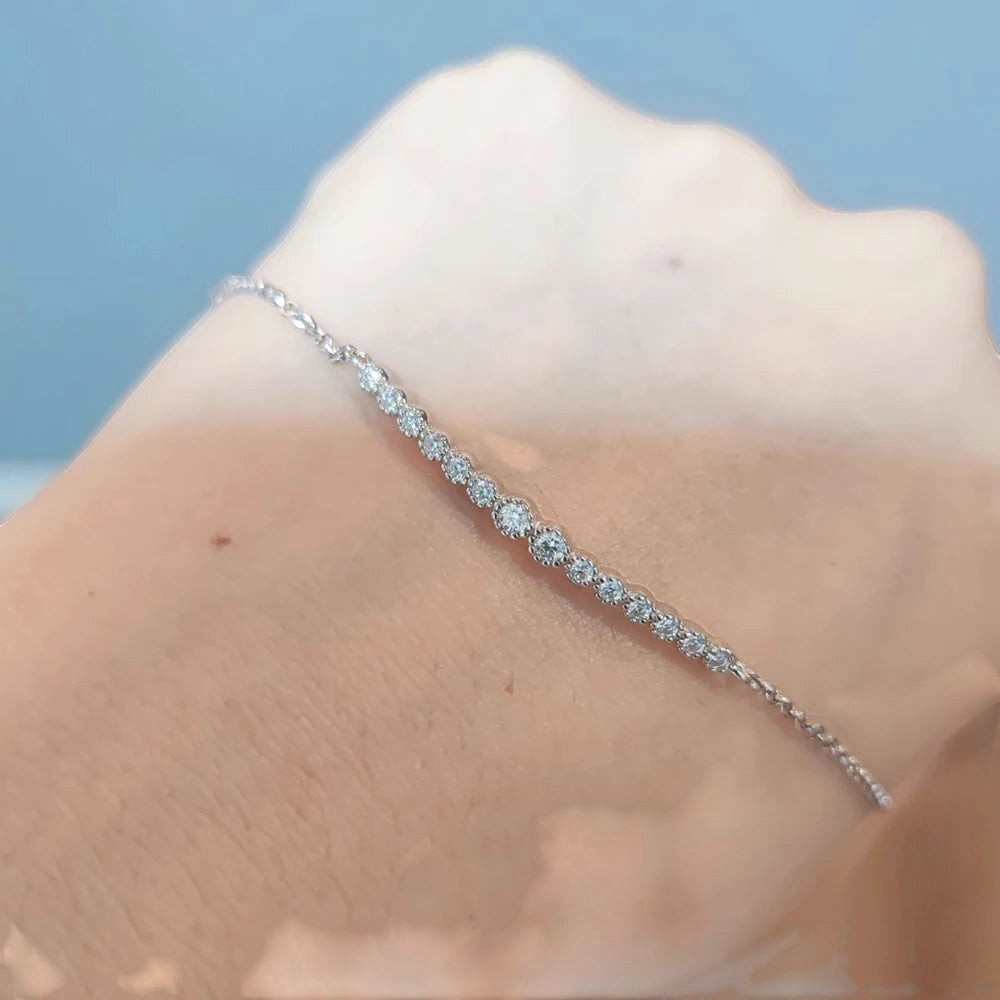 Bee-Bee's D VVS1 Moissanite Tennis Bracelet in S925 Sterling Silver with 18k white gold plating.