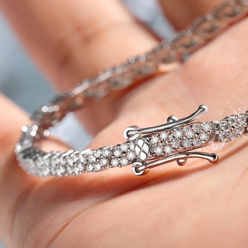 Bee-Bees 2mm D Color Moissanite Tennis Bracelet in S925 Sterling Silver with secure clasp. Dazzling, colorless stones.
