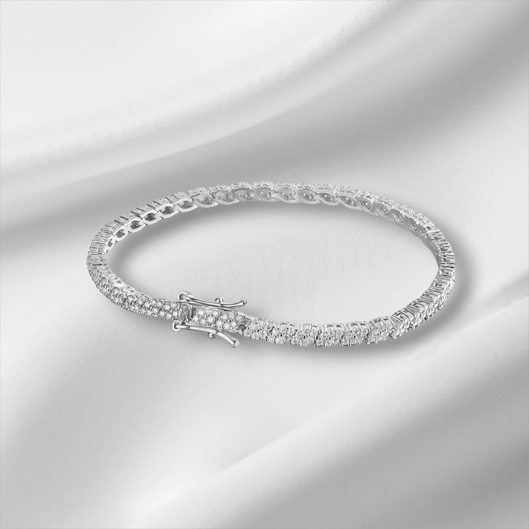 Bee-Bees 2mm D Color Moissanite Tennis Bracelet in S925 Sterling Silver with 18K White Gold plating and secure clasp.
