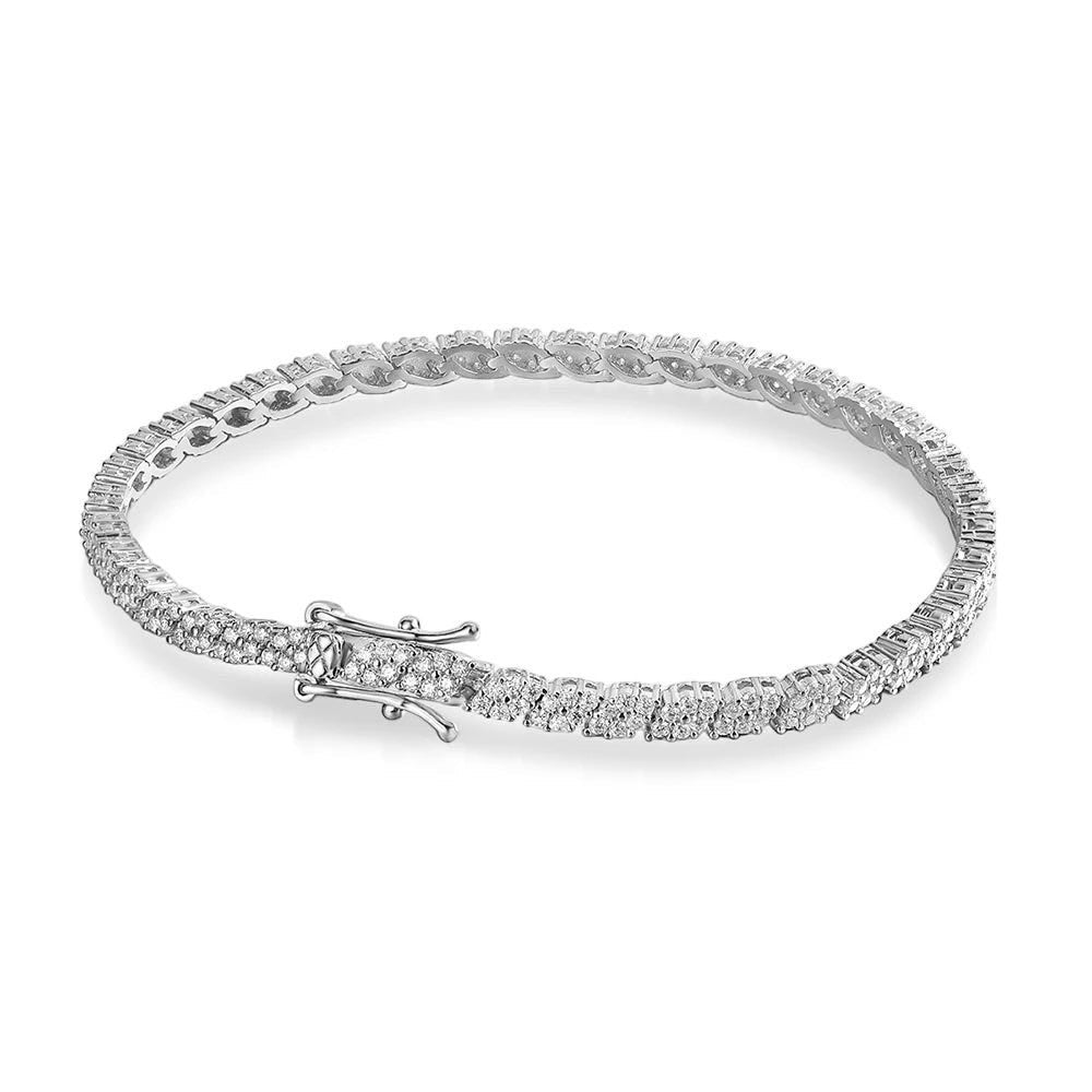 Bee-Bees 2mm D Color Moissanite Tennis Bracelet in S925 Sterling Silver with 18K White Gold plating. Features a secure clasp.