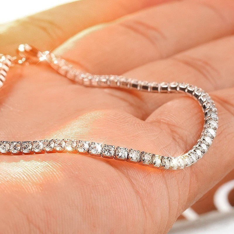 Bee-Bees 1.5mm or 2mm Moissanite tennis bracelet in sterling silver with 18k gold plating. D VVS1 stones.