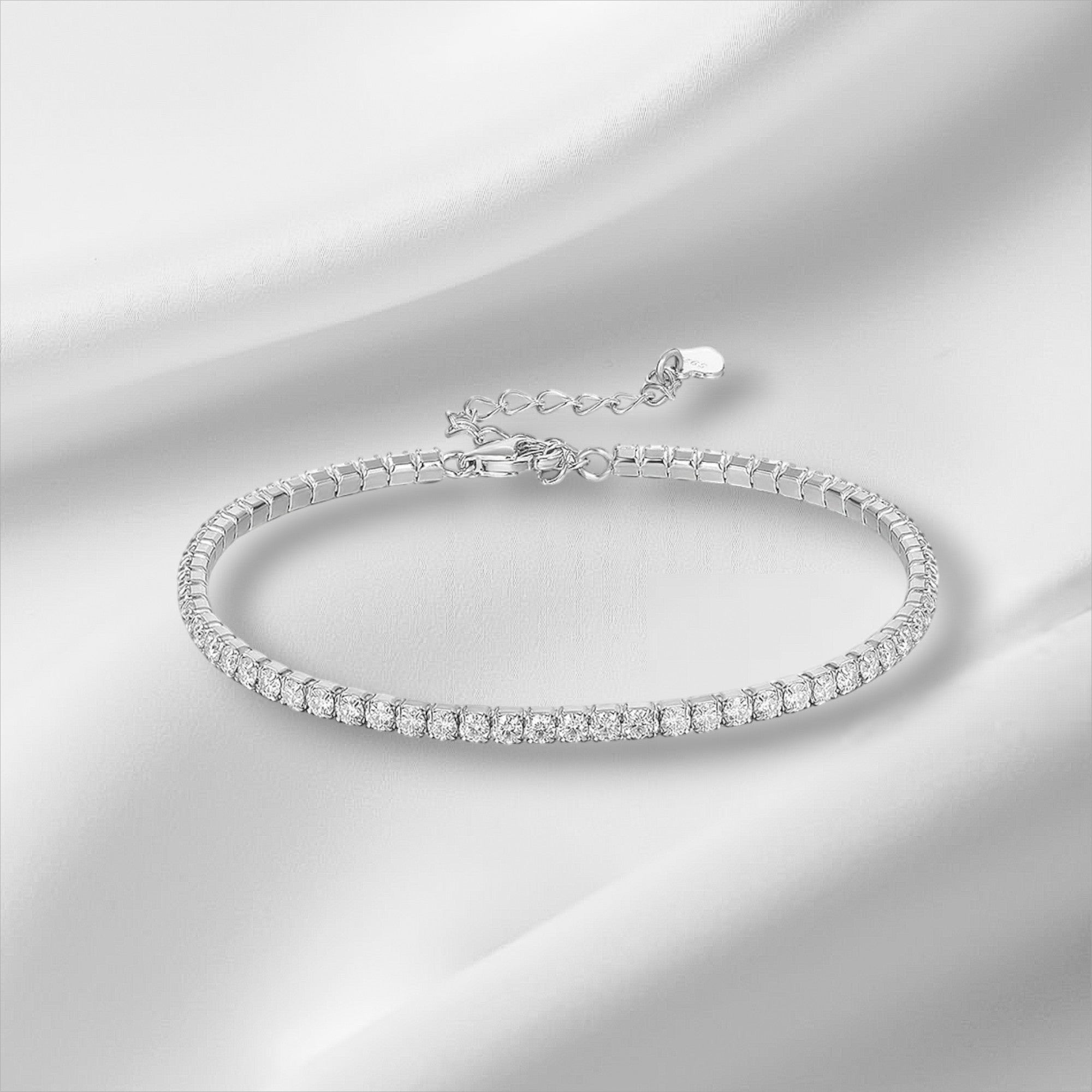 Bee-Bee's 1.5mm Moissanite tennis bracelet in sterling silver with 18k gold plating. D VVS1 stones.