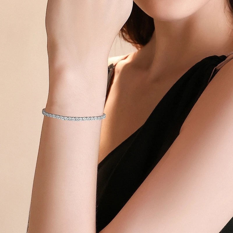 Bee-Bees 2mm D Color Moissanite Tennis Bracelet in S925 Sterling Silver with 18K White Gold plating.