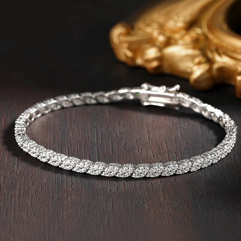Bee-Bees 2mm D Color Moissanite Tennis Bracelet in S925 Sterling Silver with 18K White Gold plating.